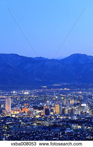 City lights and mountainscape, Yamanshi Prefecture, Japan View Large Photo Image Stock Image - City lights and mountainscape, Yamanshi Prefecture, Japan. Fotosearch