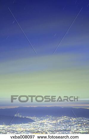 City lights and mountainscape, Yamanshi Prefecture, Japan View Large Photo Image Stock Photo - City lights and mountainscape, Yamanshi Prefecture, Japan. Fotosearch