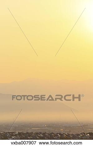 Colorful sky and cityscape, Yamanshi Prefecture, Japan View Large Photo Image Stock Photo - Colorful sky and cityscape, Yamanshi Prefecture, Japan. Fotosearch