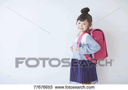 Stock Image - Cute Japanese school kid. Fotosearch