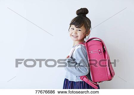 Stock Photograph - Cute Japanese school kid. Fotosearch