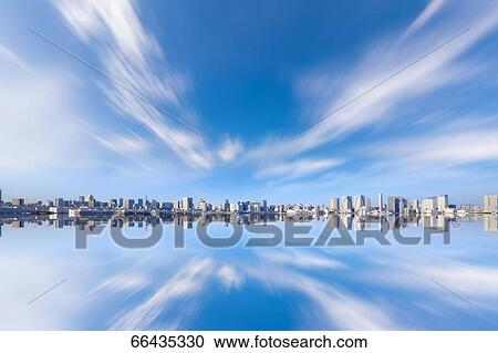 Stock Image - Digital composite of Tokyo skyline. Fotosearch
