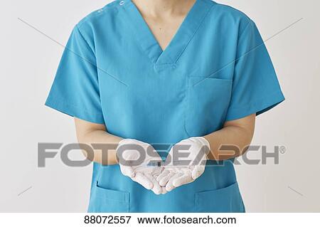 Doctor preparing injection View Large Photo Image Stock Photo - Doctor preparing injection. Fotosearch