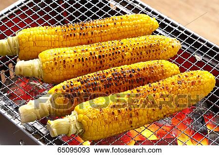 Stock Image - Grilled corn. Fotosearch