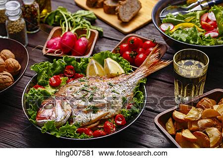 Healty and colorful grilled fish and vegetables View Large Photo Image Stock Image - Healty and colorful grilled fish and vegetables. Fotosearch