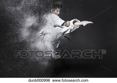 Stock Photo - Image composite of Japanese karate athlete. Fotosearch