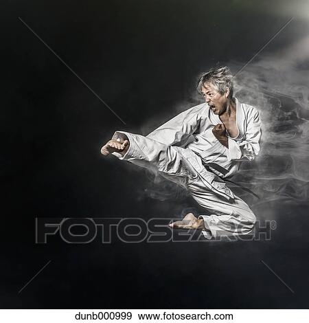 Stock Photo - Image composite of Japanese karate athlete. Fotosearch