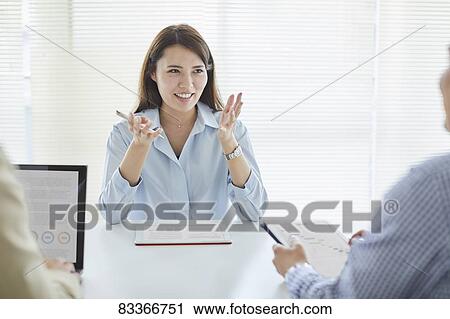 Japanese business people at work View Large Photo Image Stock Image - Japanese business people at work. Fotosearch