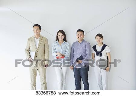 Stock Photo - Japanese business people at work. Fotosearch