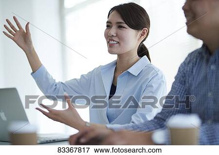 Japanese business people at work View Large Photo Image Stock Photo - Japanese business people at work. Fotosearch