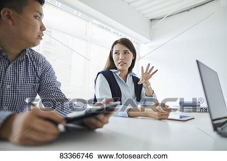 Japanese business people at work View Large Photo Image Stock Photograph - Japanese business people at work. Fotosearch