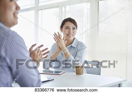 Japanese business people at work View Large Photo Image Stock Photograph - Japanese business people at work. Fotosearch