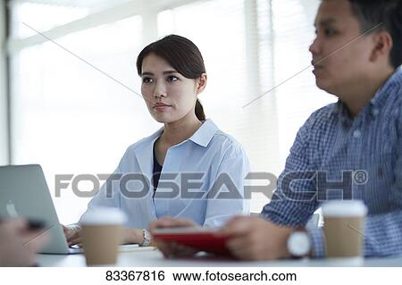 Japanese business people at work View Large Photo Image Stock Photograph - Japanese business people at work. Fotosearch