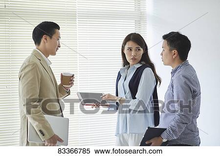 Japanese business people at work View Large Photo Image Stock Photography - Japanese business people at work. Fotosearch