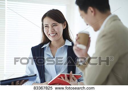 Japanese business people at work View Large Photo Image Stock Photography - Japanese business people at work. Fotosearch