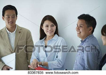 Stock Photography - Japanese business people at work. Fotosearch