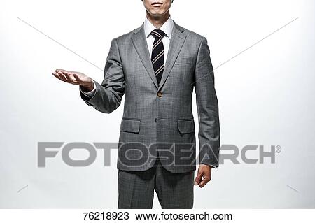 Japanese businessman against white background View Large Photo Image Stock Image - Japanese businessman against white background. Fotosearch