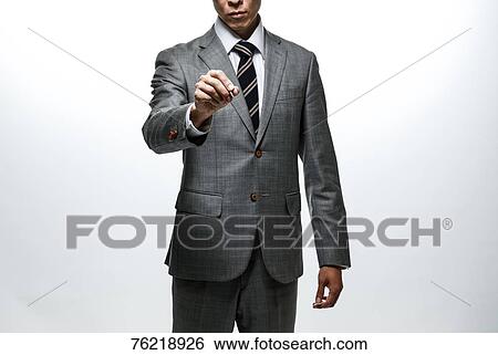 Japanese businessman against white background View Large Photo Image Stock Photograph - Japanese businessman against white background. Fotosearch