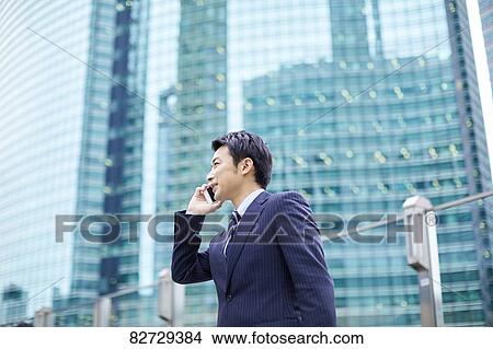 Japanese businessman downtown Tokyo View Large Photo Image Picture - Japanese businessman downtown Tokyo. Fotosearch