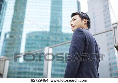Japanese businessman downtown Tokyo View Large Photo Image Picture - Japanese businessman downtown Tokyo. Fotosearch