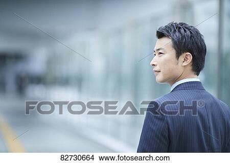 Japanese businessman downtown Tokyo View Large Photo Image Picture - Japanese businessman downtown Tokyo. Fotosearch