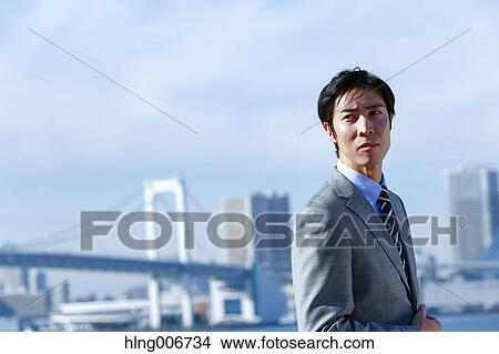 Japanese businessman downtown Tokyo, Japan View Large Photo Image Picture - Japanese businessman downtown Tokyo, Japan. Fotosearch