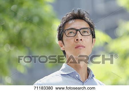 Japanese businessman downtown Tokyo View Large Photo Image Stock Image - Japanese businessman downtown Tokyo. Fotosearch
