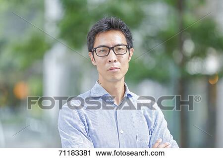 Japanese businessman downtown Tokyo View Large Photo Image Stock Image - Japanese businessman downtown Tokyo. Fotosearch