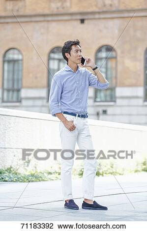 Japanese businessman downtown Tokyo View Large Photo Image Stock Image - Japanese businessman downtown Tokyo. Fotosearch