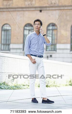 Japanese businessman downtown Tokyo View Large Photo Image Stock Image - Japanese businessman downtown Tokyo. Fotosearch