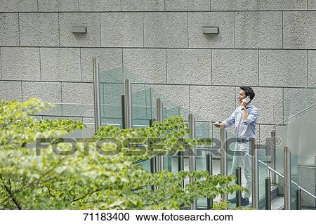 Japanese businessman downtown Tokyo View Large Photo Image Stock Image - Japanese businessman downtown Tokyo. Fotosearch
