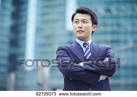 Japanese businessman downtown Tokyo View Large Photo Image Stock Image - Japanese businessman downtown Tokyo. Fotosearch