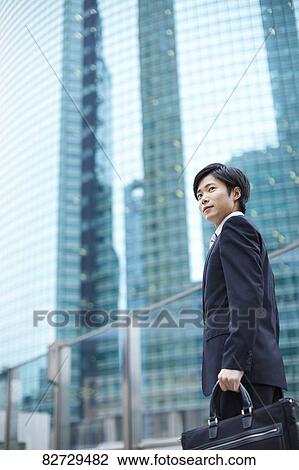 Japanese businessman downtown Tokyo View Large Photo Image Stock Image - Japanese businessman downtown Tokyo. Fotosearch