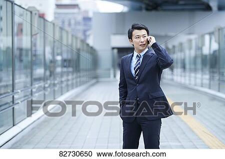 Japanese businessman downtown Tokyo View Large Photo Image Stock Image - Japanese businessman downtown Tokyo. Fotosearch