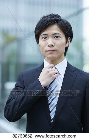 Japanese businessman downtown Tokyo View Large Photo Image Stock Image - Japanese businessman downtown Tokyo. Fotosearch