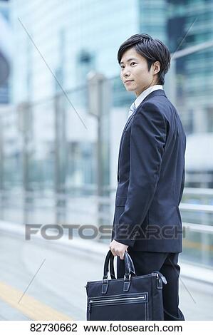 Japanese businessman downtown Tokyo View Large Photo Image Stock Image - Japanese businessman downtown Tokyo. Fotosearch