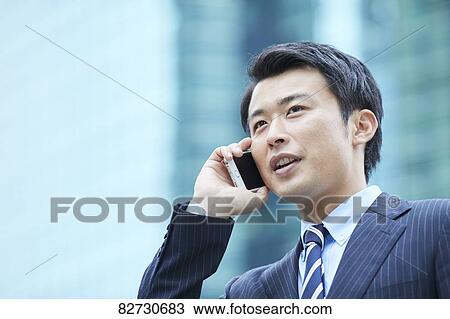 Japanese businessman downtown Tokyo View Large Photo Image Stock Image - Japanese businessman downtown Tokyo. Fotosearch