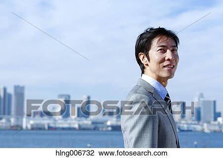 Japanese businessman downtown Tokyo, Japan View Large Photo Image Stock Image - Japanese businessman downtown Tokyo, Japan. Fotosearch