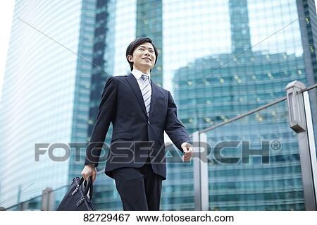 Japanese businessman downtown Tokyo View Large Photo Image Stock Photo - Japanese businessman downtown Tokyo. Fotosearch