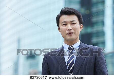 Japanese businessman downtown Tokyo View Large Photo Image Stock Photo - Japanese businessman downtown Tokyo. Fotosearch