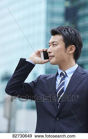 Japanese businessman downtown Tokyo View Large Photo Image Stock Photo - Japanese businessman downtown Tokyo. Fotosearch