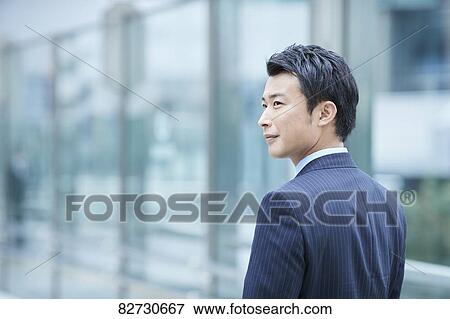 Japanese businessman downtown Tokyo View Large Photo Image Stock Photo - Japanese businessman downtown Tokyo. Fotosearch