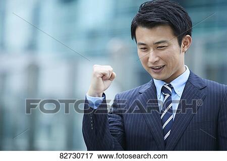 Japanese businessman downtown Tokyo View Large Photo Image Stock Photo - Japanese businessman downtown Tokyo. Fotosearch