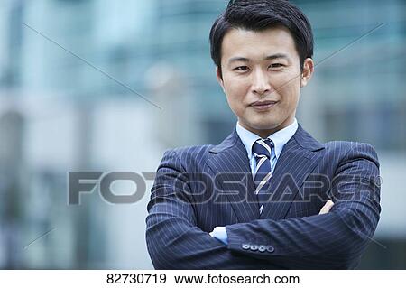 Japanese businessman downtown Tokyo View Large Photo Image Stock Photo - Japanese businessman downtown Tokyo. Fotosearch