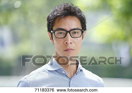 Japanese businessman downtown Tokyo View Large Photo Image Stock Photograph - Japanese businessman downtown Tokyo. Fotosearch