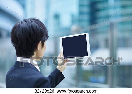 Japanese businessman downtown Tokyo View Large Photo Image Stock Photograph - Japanese businessman downtown Tokyo. Fotosearch