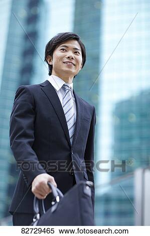 Stock Photography - Japanese businessman downtown Tokyo. Fotosearch