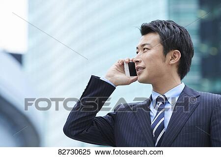 Japanese businessman downtown Tokyo View Large Photo Image Stock Photography - Japanese businessman downtown Tokyo. Fotosearch