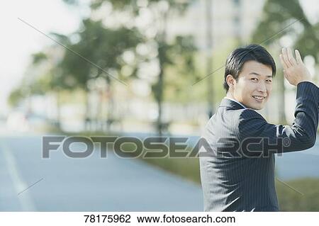 Japanese businessman going to work View Large Photo Image Stock Image - Japanese businessman going to work. Fotosearch