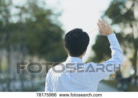 Japanese businessman going to work View Large Photo Image Stock Photograph - Japanese businessman going to work. Fotosearch